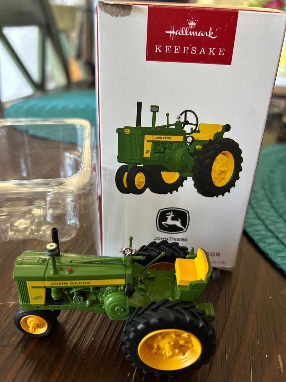 Hallmark John Deere tractor ornament and toy new in box.